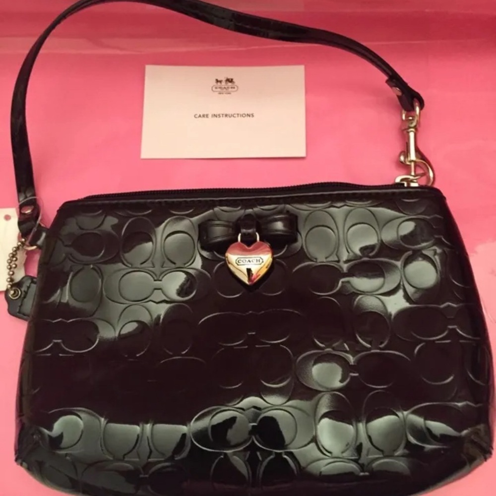 Coach black heart wristlet bag